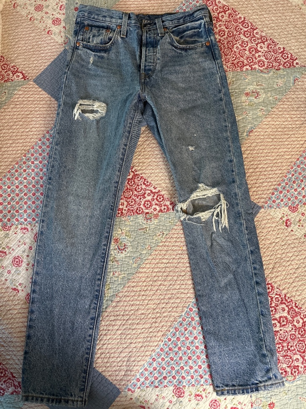 Levi’s Premium, medium wash distressed button fly size 25